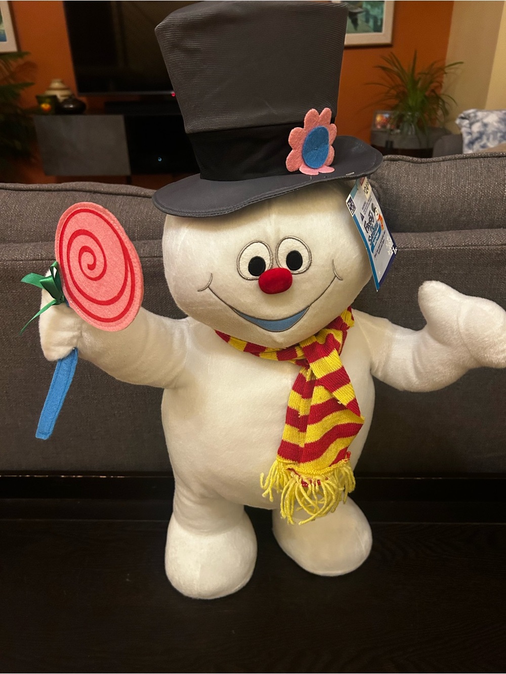 27” Plush Snowman Party Figure with Red & Yellow Scarf and Candy Prop